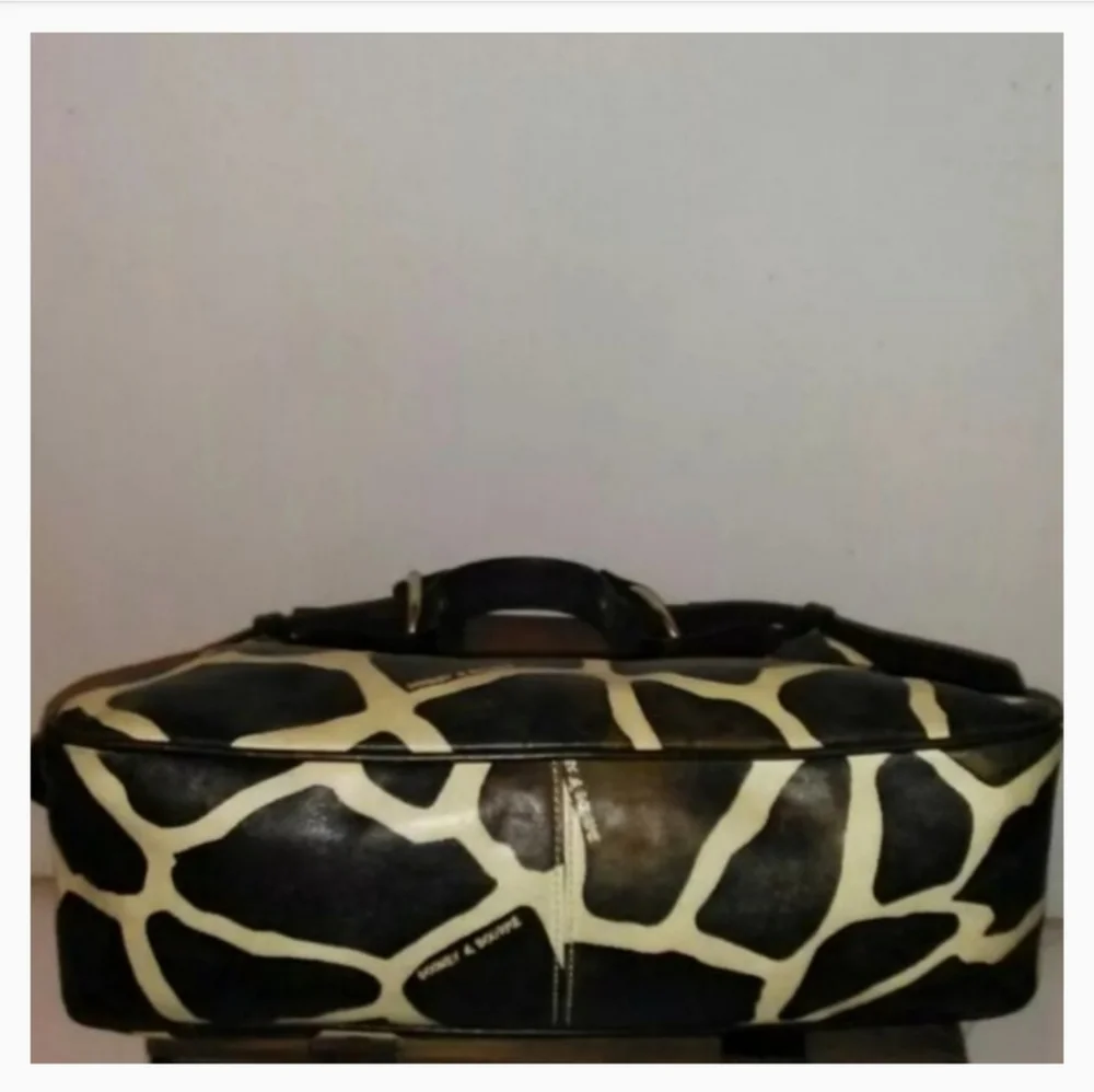 Dooney and Bourke leather giraffe pattern handbag
